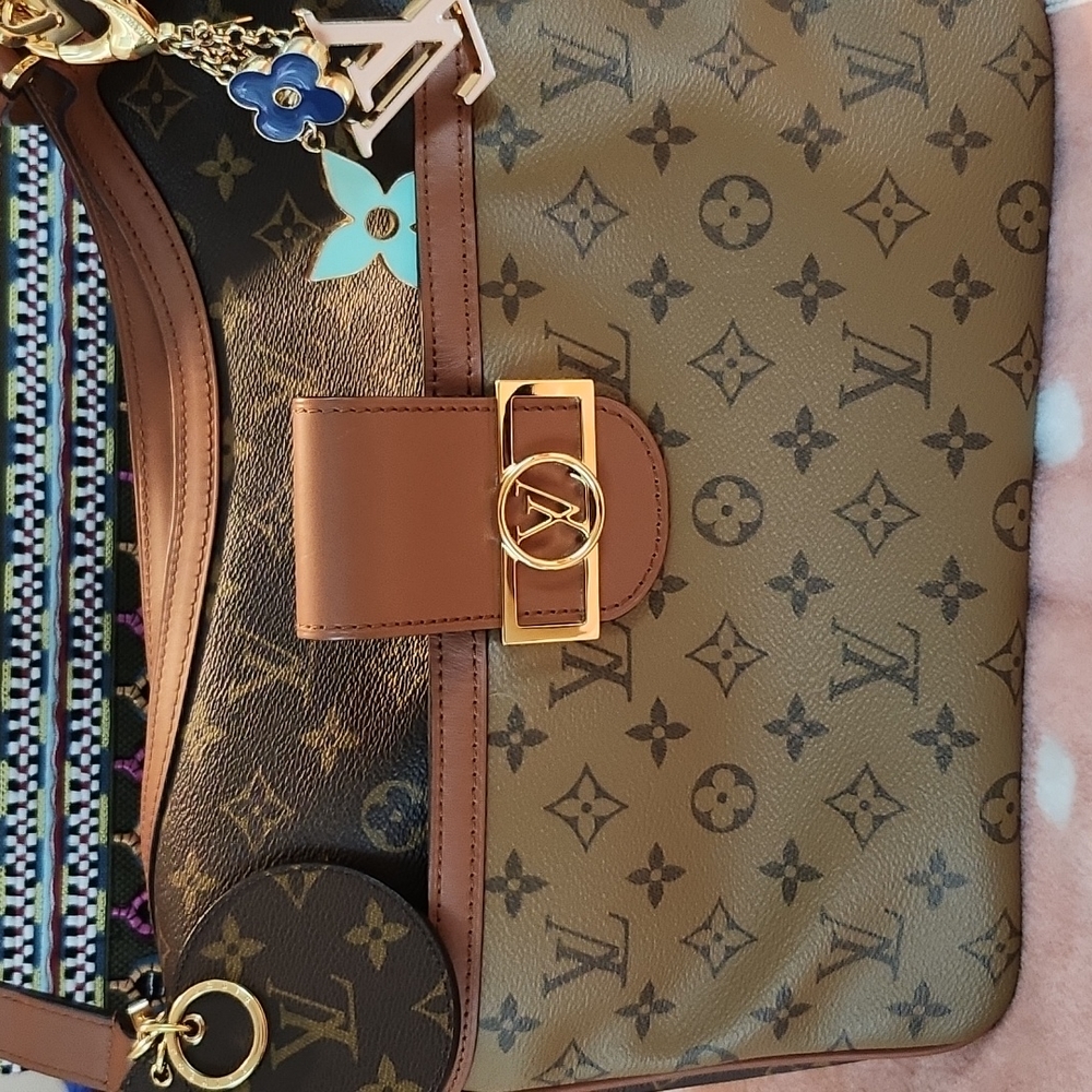 LV bag charm. Retail price $475
